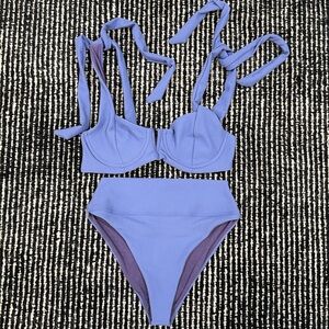 Beach riot - sold together. Never worn. Medium top, small bottoms.